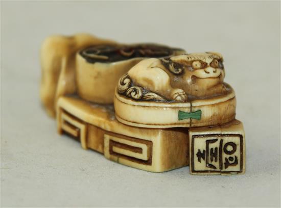 A Japanese ivory multi seal netsuke, 19th century, 5cm